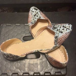 Multi color snake skin flats.